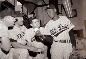Mickey Mantle and Vic Dimaggio listen to Satchel Paige school them on throwing the stinky cheese