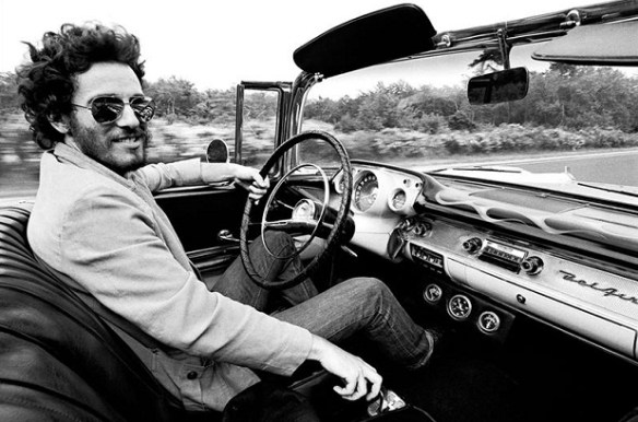 Springsteen driving a Chevy Bel Aire
