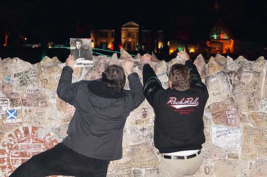 Shawn and Ryan jumping the wall, ala 1976. That's a copy of Backstreets Shawn is holding, not Time or Newsweek