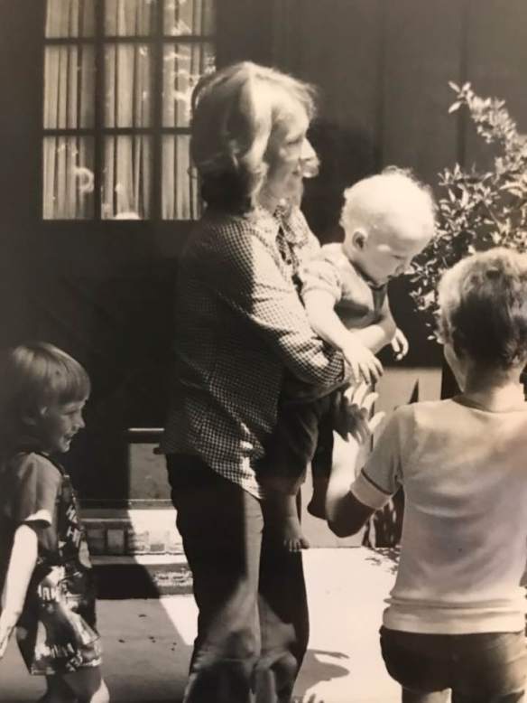 Mom with boys black and white